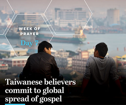 Two young men from Taiwan talking, overlooking a city and a body of water. Taiwanese Churches Commit to Global Spread of the Gospel for Day 7 of the Week of Prayer for International Missions. Image by IMB.